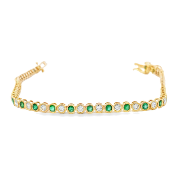 14kt Yellow Gold Emerald and Diamond Bezel Tennis Bracelet